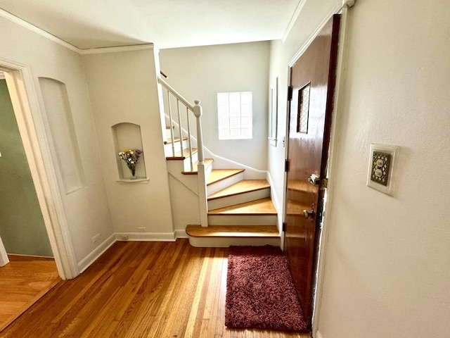 10043 S Artesian Ave, Chicago, IL 60655 - entrance foyer with wood finished floors, stairway, and crown molding