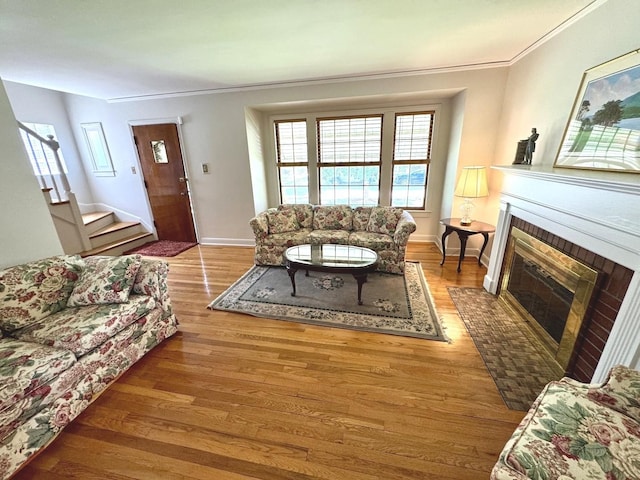 10043 S Artesian Ave, Chicago, IL 60655 - living room with a brick fireplace, wood finished floors, ornamental molding, and stairs