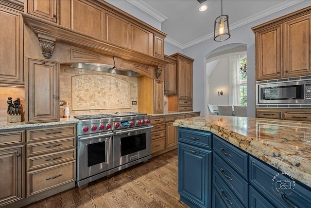 1088 Dunstan Rd, Geneva, IL 60134 - kitchen featuring appliances with stainless steel finishes, arched walkways, decorative backsplash, blue cabinetry, and dark wood-style floors