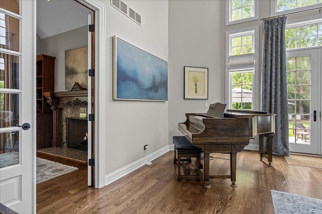 1088 Dunstan Rd, Geneva, IL 60134 - living area with wood finished floors, a fireplace, an office area, and a high ceiling