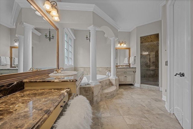 1088 Dunstan Rd, Geneva, IL 60134 - full bath featuring ornate columns, two vanities, a bath, a stall shower, and crown molding