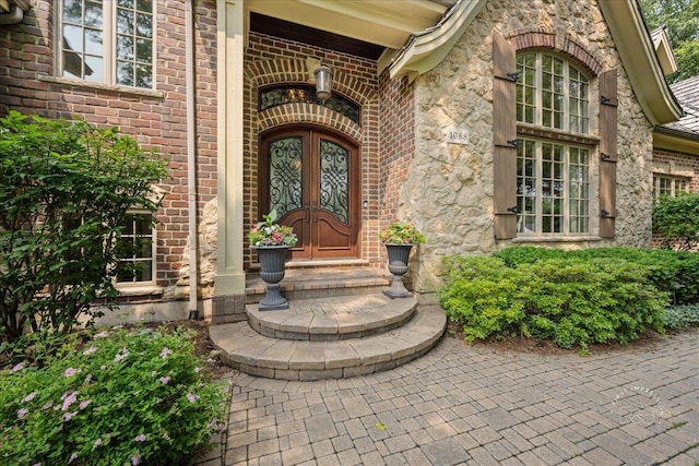 1088 Dunstan Rd, Geneva, IL 60134 - doorway to property featuring french doors and brick siding