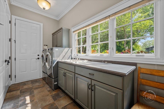 1088 Dunstan Rd, Geneva, IL 60134 - laundry room featuring cabinet space, washing machine and dryer, dark stone finish floors, and ornamental molding