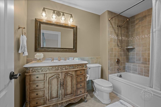 1088 Dunstan Rd, Geneva, IL 60134 - bathroom featuring shower / tub combo, vanity, tile walls, tile patterned flooring, and a wainscoted wall