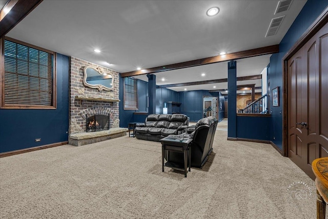 1088 Dunstan Rd, Geneva, IL 60134 - carpeted living area with beamed ceiling, a fireplace, recessed lighting, decorative columns, and stairs