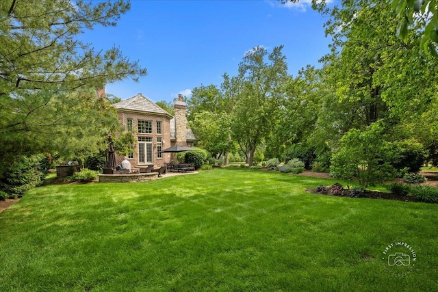1088 Dunstan Rd, Geneva, IL 60134 - view of green lawn with a gazebo and a patio area
