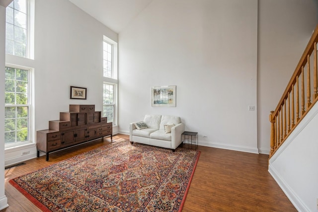 513 Citadel Cir, Westmont, IL 60559 - living area featuring a high ceiling, dark wood-type flooring, and stairs
