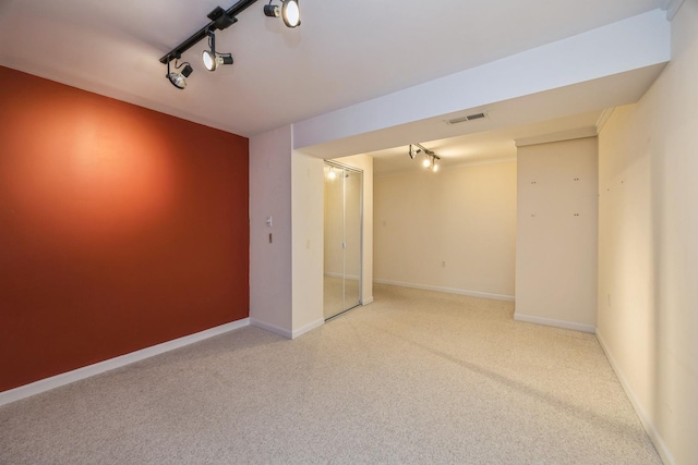 513 Citadel Cir, Westmont, IL 60559 - carpeted spare room with rail lighting and baseboards