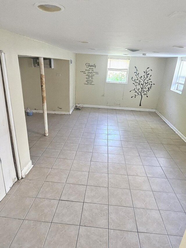 15210 Evers St, Dolton, IL 60419 - basement featuring healthy amount of natural light, light tile patterned floors, and baseboards