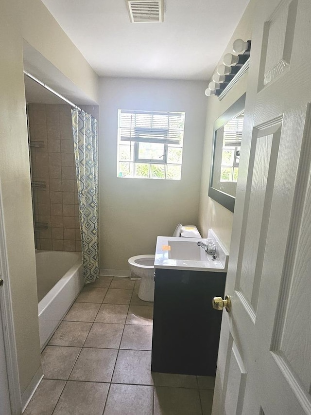 15210 Evers St, Dolton, IL 60419 - bathroom featuring toilet, vanity, tile patterned floors, and shower / tub combo