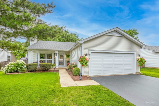 1910 Baldwin Way, Bolingbrook, IL 60490 - ranch-style house featuring asphalt driveway, a front lawn, a garage, and a chimney
