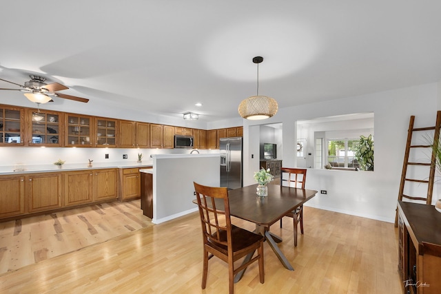 1910 Baldwin Way, Bolingbrook, IL 60490 - dining room featuring light wood-style flooring and a ceiling fan