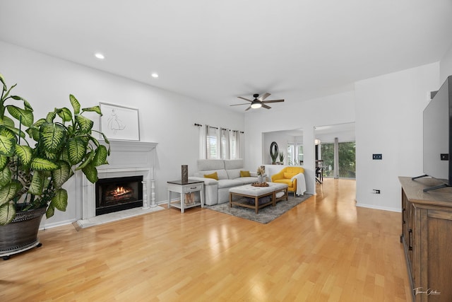 1910 Baldwin Way, Bolingbrook, IL 60490 - living room with ceiling fan, light wood-style flooring, plenty of natural light, a premium fireplace, and recessed lighting