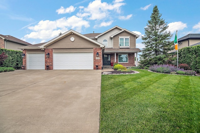 24450 Shawnee Ln, Manhattan, IL 60442 - view of front facade with a front lawn, an attached garage, brick siding, and concrete driveway