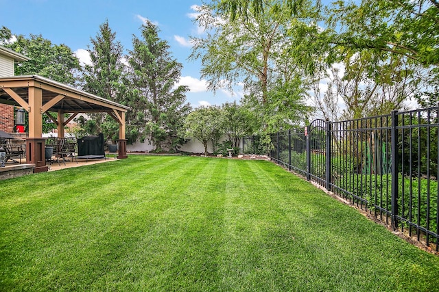 24450 Shawnee Ln, Manhattan, IL 60442 - fenced backyard featuring a gazebo and a patio
