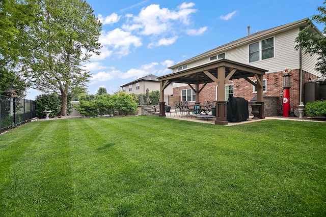 24450 Shawnee Ln, Manhattan, IL 60442 - back of property featuring a gazebo, brick siding, a fenced backyard, and a patio area
