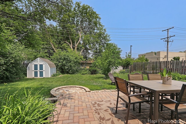 4008 W Lillian St, Mchenry, IL 60050 - view of patio featuring a shed and outdoor dining area