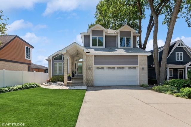 6N142 Riverside Dr, Saint Charles, IL 60175 - view of front of house featuring brick siding, concrete driveway, and an attached garage