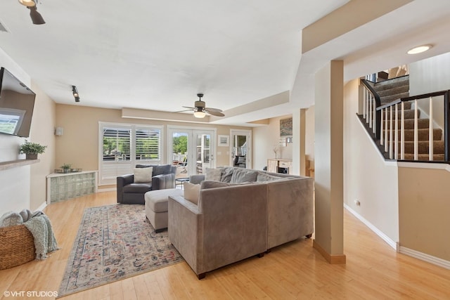 6N142 Riverside Dr, Saint Charles, IL 60175 - living room with ceiling fan, light wood-style flooring, stairs, and french doors