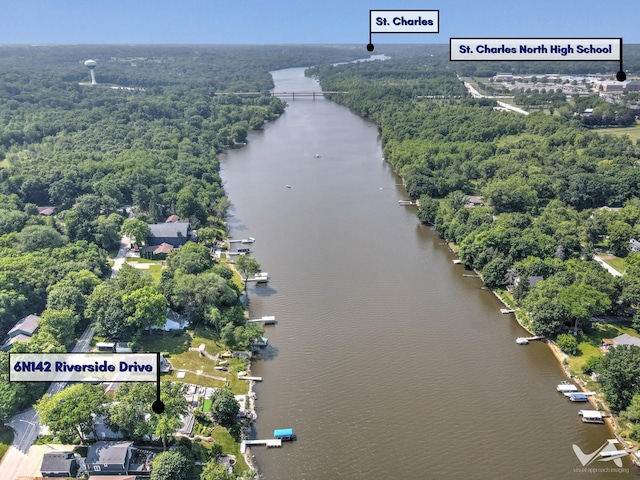 6N142 Riverside Dr, Saint Charles, IL 60175 - aerial view of property and surrounding area featuring a large body of water and a heavily wooded area