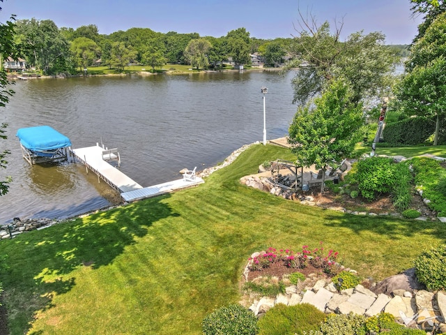 6N142 Riverside Dr, Saint Charles, IL 60175 - dock area with a water view, boat lift, and a lawn