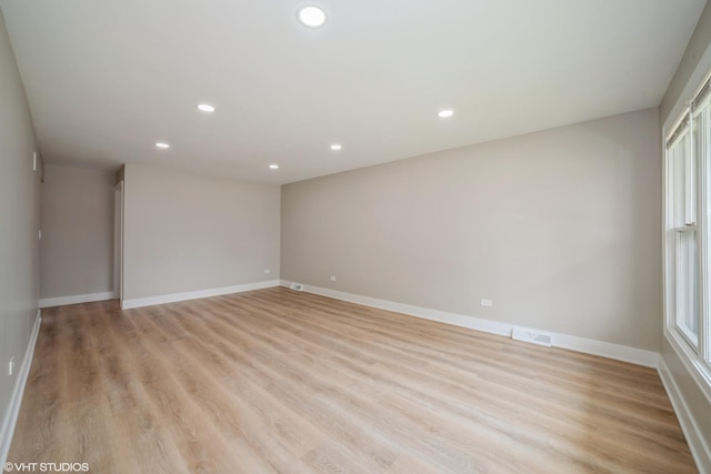 364 Hoxie Ave, Calumet City, IL 60409 - unfurnished room with recessed lighting, light wood-style floors, and healthy amount of natural light