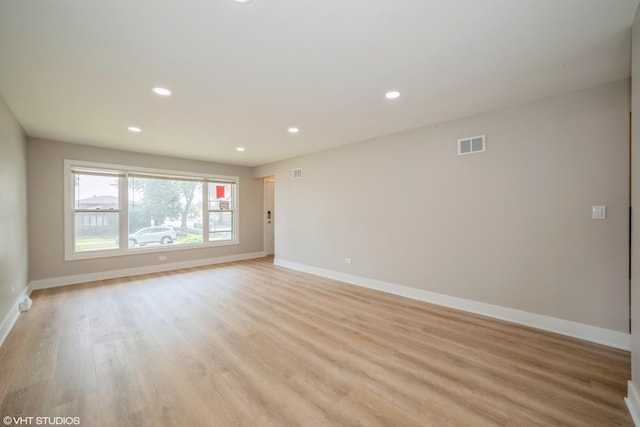 364 Hoxie Ave, Calumet City, IL 60409 - empty room featuring light wood finished floors and recessed lighting