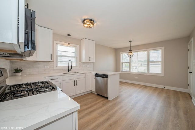 364 Hoxie Ave, Calumet City, IL 60409 - kitchen with stainless steel dishwasher, light wood-type flooring, tasteful backsplash, and white cabinets