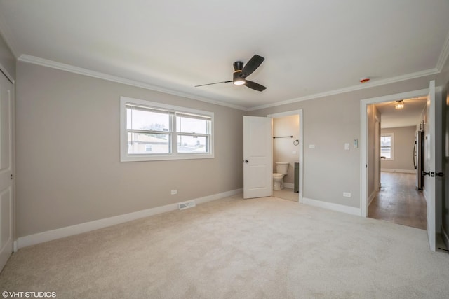 364 Hoxie Ave, Calumet City, IL 60409 - unfurnished bedroom with crown molding, multiple windows, carpet floors, connected bathroom, and ceiling fan