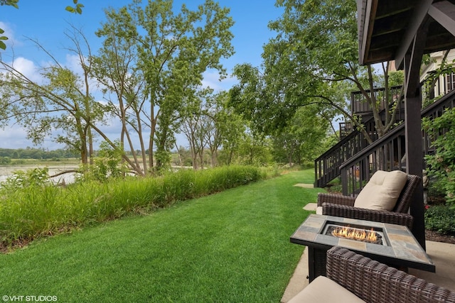 37 Harborside Way, Hawthorn Woods, IL 60047 - view of grassy yard featuring a fire pit, stairway, and a patio area