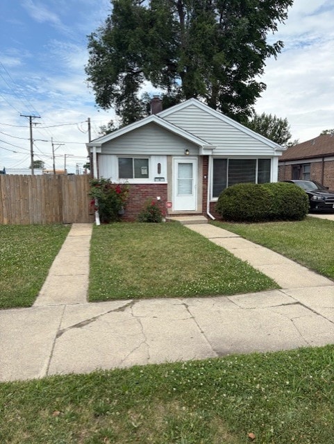 12636 S Loomis St, Calumet Park, IL 60827 - bungalow-style home featuring brick siding and a chimney