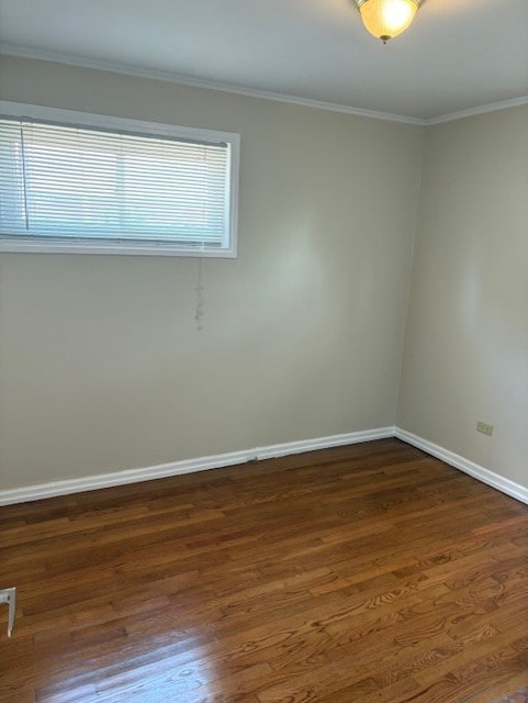 12636 S Loomis St, Calumet Park, IL 60827 - unfurnished room featuring ornamental molding and dark wood-type flooring
