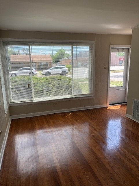 12636 S Loomis St, Calumet Park, IL 60827 - spare room featuring wood finished floors and plenty of natural light