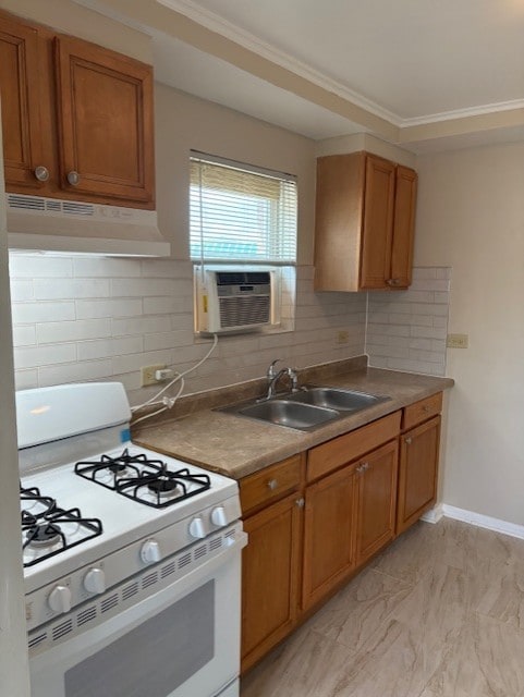 12636 S Loomis St, Calumet Park, IL 60827 - kitchen featuring white gas range, under cabinet range hood, brown cabinets, backsplash, and ornamental molding
