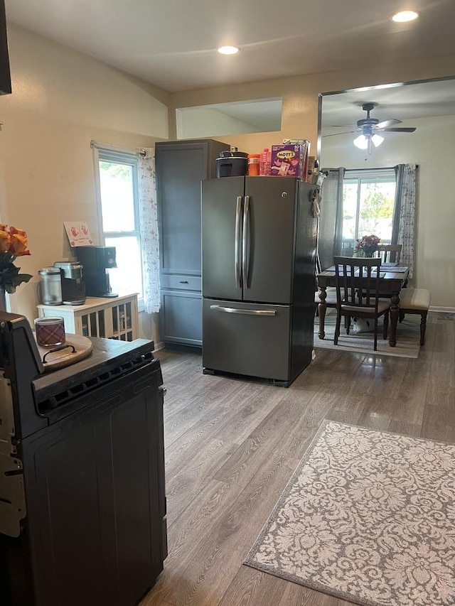 1901 Cora St, Crest Hill, IL 60403 - kitchen with freestanding refrigerator, recessed lighting, a ceiling fan, and light wood-style floors