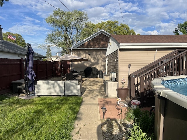1901 Cora St, Crest Hill, IL 60403 - back of property with stairway and roof with shingles