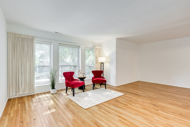 5400 S Hyde Park Blvd Unit 10C, Chicago, IL 60615 - sitting room featuring hardwood / wood-style flooring and baseboards