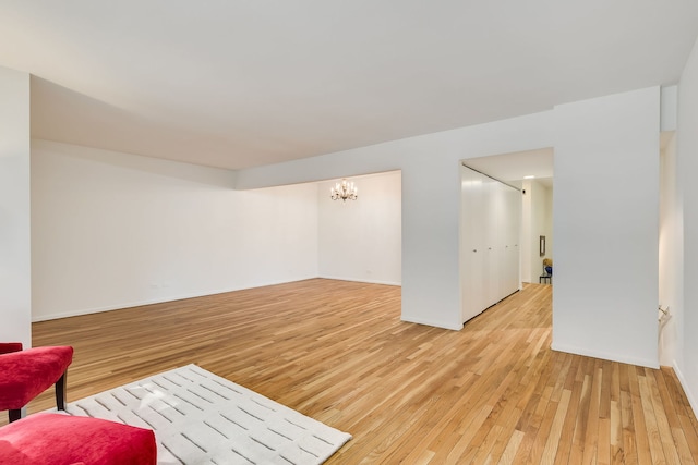 5400 S Hyde Park Blvd Unit 10C, Chicago, IL 60615 - living room with a chandelier and light wood finished floors