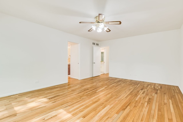5400 S Hyde Park Blvd Unit 10C, Chicago, IL 60615 - spare room featuring light wood-style floors and a ceiling fan