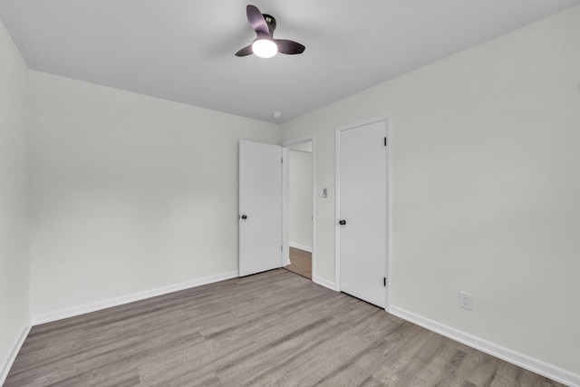 2270 177th St, Lansing, IL 60438 - empty room with ceiling fan, wood finished floors, and baseboards