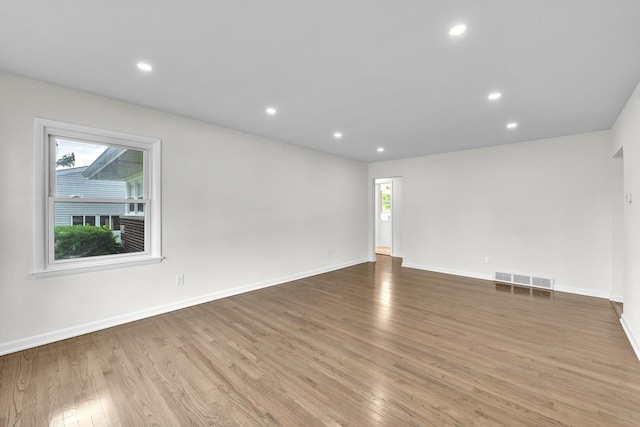 2270 177th St, Lansing, IL 60438 - unfurnished room featuring plenty of natural light, wood finished floors, baseboards, and recessed lighting