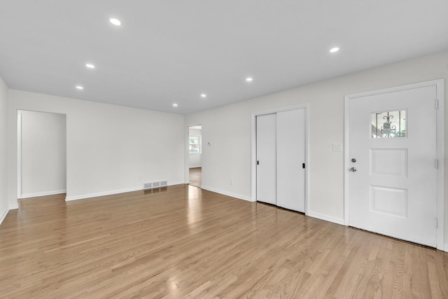 2270 177th St, Lansing, IL 60438 - unfurnished living room with light wood finished floors, recessed lighting, and baseboards