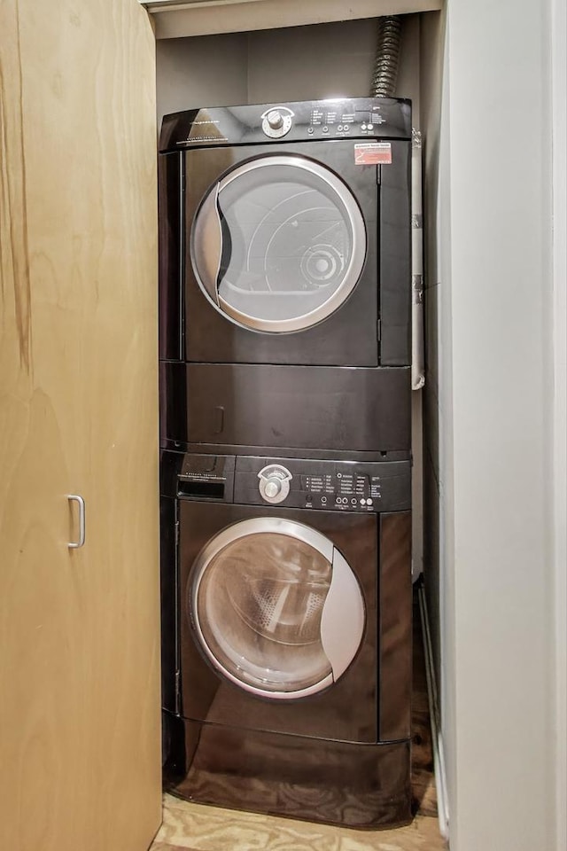 2031 W Evergreen Ave Unit 1W, Chicago, IL 60622 - washroom with estacked washer and dryer