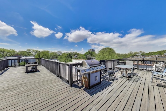 2031 W Evergreen Ave Unit 1W, Chicago, IL 60622 - deck with a grill and outdoor dining space