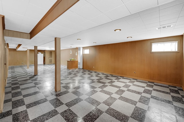 10021 Cook Ave, Oak Lawn, IL 60453 - basement featuring wooden walls, tile patterned floors, and a paneled ceiling