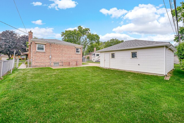 10021 Cook Ave, Oak Lawn, IL 60453 - rear view of house featuring a patio and roof with shingles