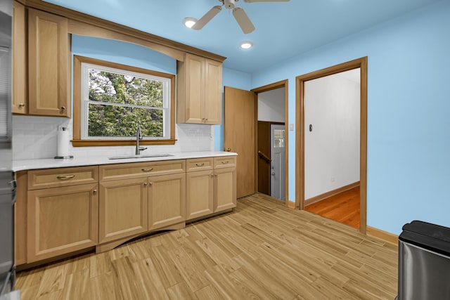 10021 Cook Ave, Oak Lawn, IL 60453 - kitchen with light countertops, decorative backsplash, light wood-style floors, ceiling fan, and light brown cabinets