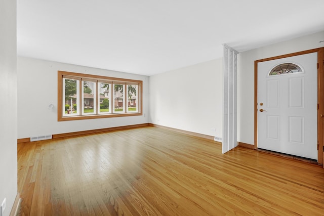 10021 Cook Ave, Oak Lawn, IL 60453 - foyer entrance with light wood-style floors and baseboards