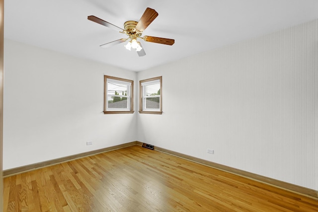 10021 Cook Ave, Oak Lawn, IL 60453 - unfurnished room featuring light wood-style floors and a ceiling fan