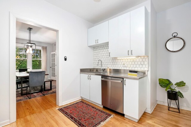 2127 W Pierce Ave Unit 2A, Chicago, IL 60622 - kitchen featuring stainless steel countertops, stainless steel dishwasher, light wood-type flooring, and white cabinets
